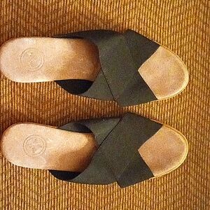 Size 9 Black slip ons.  Elastic top with cork sole.